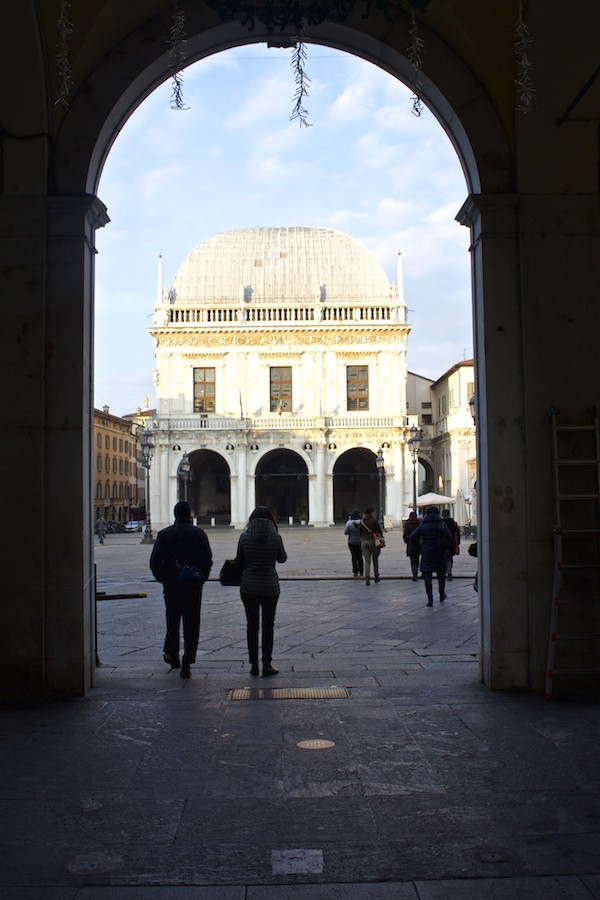 Visit Brescia - Piazza della Loggia by Day Through Arches