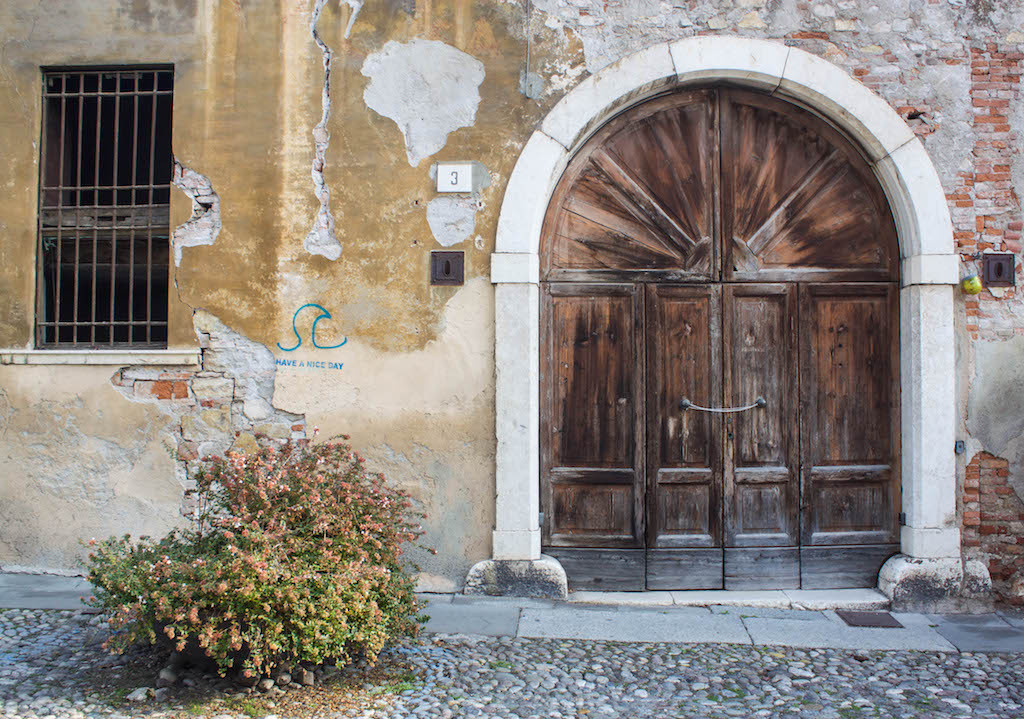 Streets of Brescia - Old Door and Sweet Saying