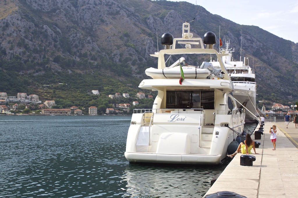 Kotor Montenegro - Yacht and Posing Tourists