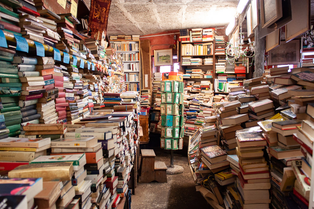 Books In Boats At The Libreria Acqua Alta Bookstore in Venice